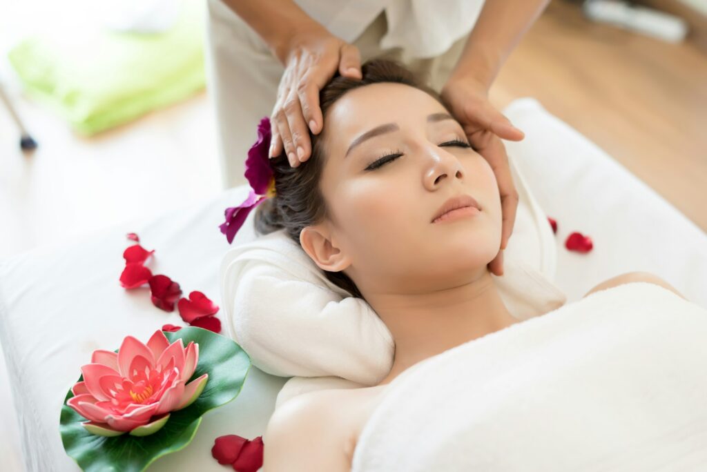 Traditional oriental massage therapy treatments. Young beautiful have massage woman in spa salon.